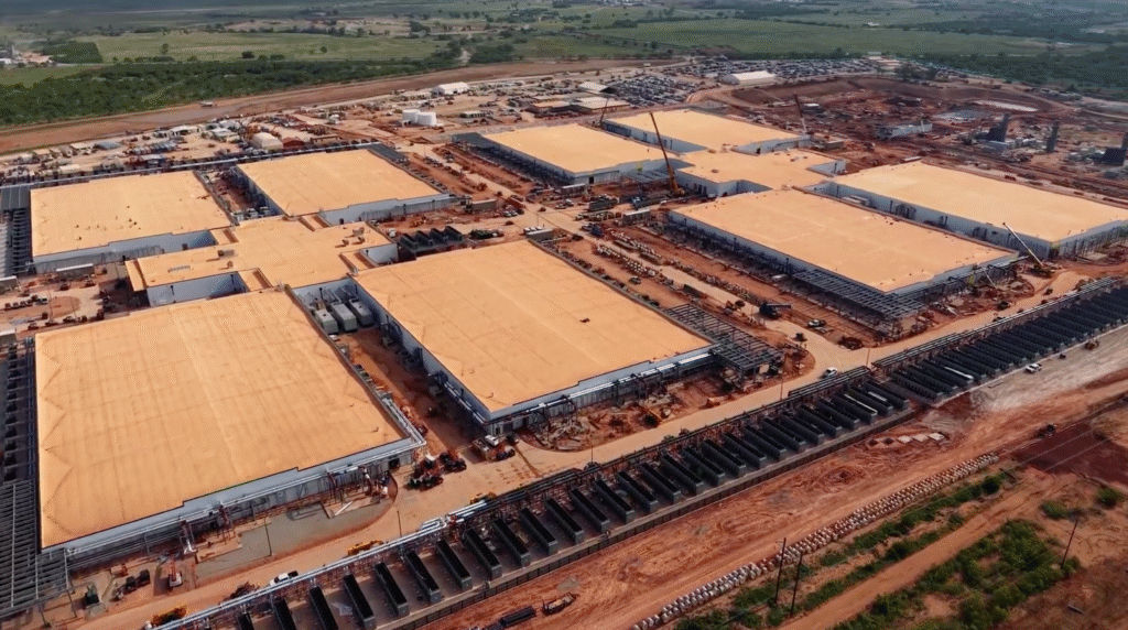 Aerial view of large industrial construction site.